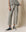 Someone rocks a THE GREAT. CORE KNITS Varsity Grey Wide Leg Cropped Sweatpant, perfectly paired with black high-top sneakers.