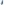 A bright blue cashmere sock by THE GREAT. HOL 22 D2 CASHMERE stands out against a plain white background.